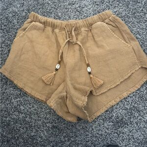 Beachy pull on shorts with shell tie tassles